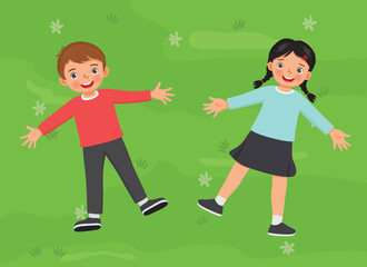Cute little kids boy and girl lying on the green grass field together