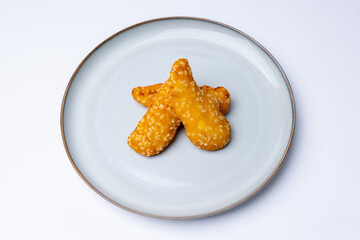 Crispy Battered Fish Fillets on a White Plate