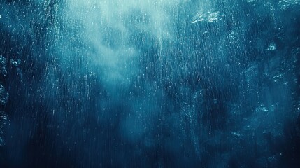 raindrops falling on a blue background