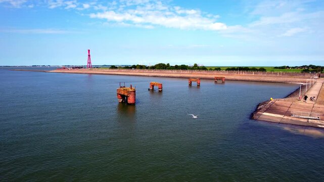 Eckwarderh&ouml;rne - Butjadinger Land - rising aerial photograph at the old ferry dock with a view of the lighthouse at Fluegeldeich