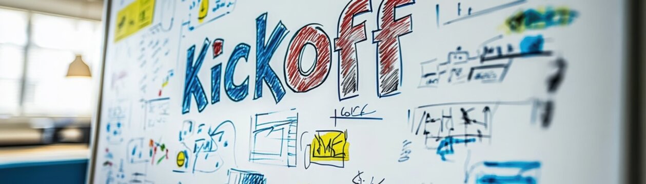 A whiteboard covered with colorful doodles and notes, prominently featuring the word "Kickoff," indicating a brainstorming session or project launch