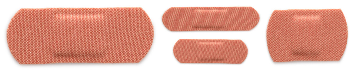 Many different medical plasters isolated on white, set