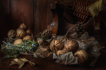Dry autumn leaves and walnuts