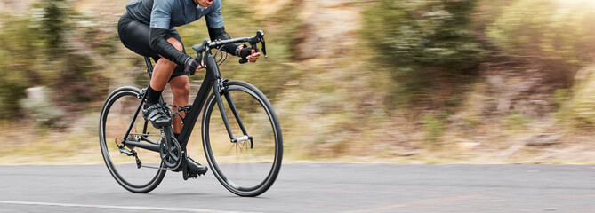 Man, fitness and speed on bicycle on cycling for exercise, workout and practice in California. Male...