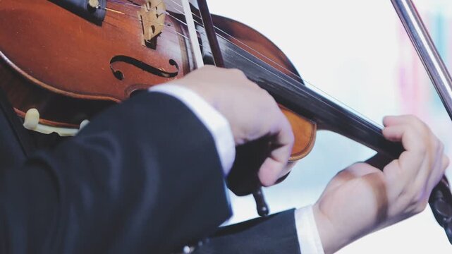 detail of a violin during an orchestra concert