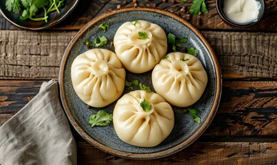 Delicious traditional Chinese bao bans, baozi in a bowl on rustic background. China traditional delicacy dumplings