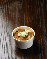 Tiramisu in Cardboard Cup for a Portable Italian Dessert Experience.