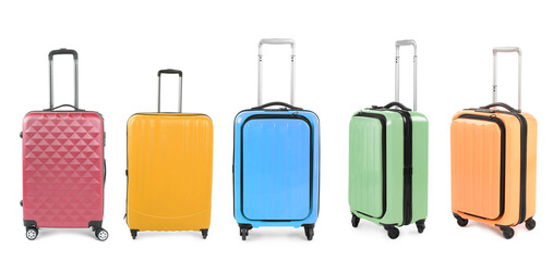 Stylish colorful suitcases on white background, set