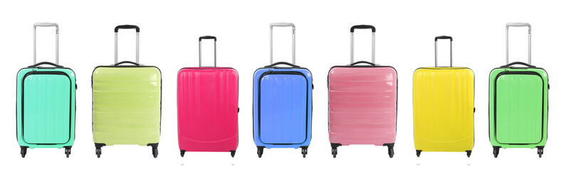 Stylish suitcases of different colors on white background, set