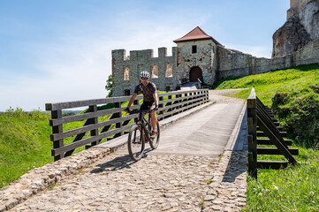 Man on a bicycle. Rabsztyn Castle. © Tomasz Warszewski