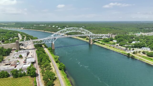 Sagamore bridge over cape cod canal on a sunny day, aerial view