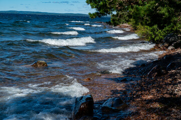 water splashes over rocks in lake Vattern Motala Sweden