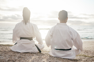 Beach, karate and couple with training, back and fitness with martial arts, meditation and practice. Motivation, outdoor and ocean with man, wellness and lens flare with exercise, calm and balance © Fanti/peopleimages.com