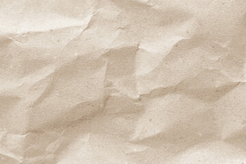 Crumpled brown paper texture background for design with copy space for text or image.