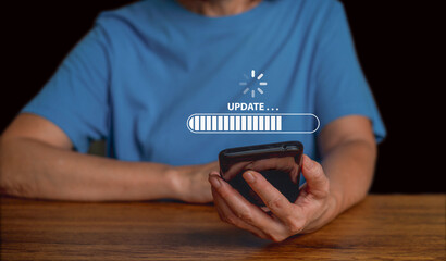 Close up woman using  smartphone for download application or data from website,updating progress bar,technology concept.