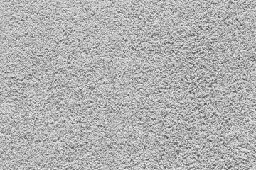 Gray epdm flooring, where the material is shaped like sand but is soft.
