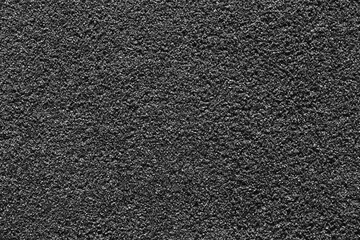 Black epdm flooring, where the material is shaped like sand but is soft and is commonly.