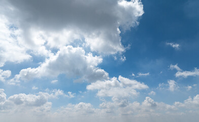 Fototapeta premium Beautiful view of blue sky with clouds at sunrise. Partly cloudy. Colorful sunset. Natural sky background texture, beautiful color.