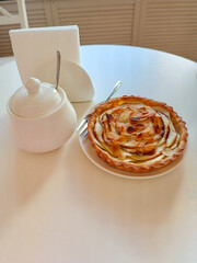Apple tart on a table in a cafe