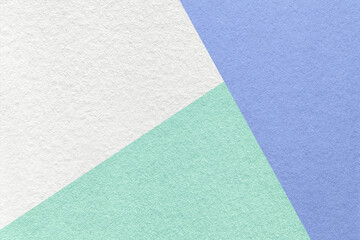 Texture of craft white, green and blue shade color paper background, macro. Vintage abstract pastel cardboard