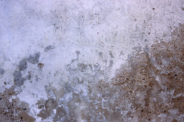 Weathered and textured concrete wall, perfect for backgrounds, textures, industrial design projects, architecture, construction, and rustic visuals. Copy space