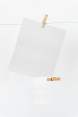 Papers mockup png hanging from a rope with paper clips