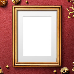 Golden Christmas picture frame mockup on a red background