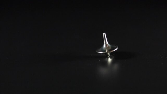 Spinning Top in Motion