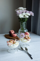Greek yoghurt with peach and honey. Hight key. Place for text
