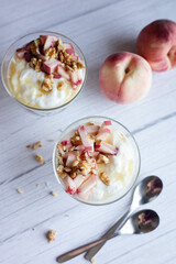 Greek yoghurt with peach and honey. Hight key. Place for text
