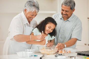 Teaching, child and grandparents with baking in kitchen for helping, mixing and learning cake recipe in home. Family, senior people and girl kid with raw ingredients for cooking education and support