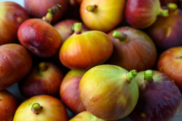 Fresh fig fruits. Whole figs on dark background.