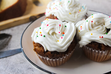 cupcake with icing and sprinkles