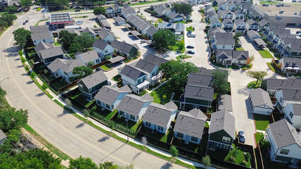 Narrow lot house single family units for rent along Northeast Green Oaks Boulevard in North Arlington, Texas, detached shotgun style homes in suburbs Dallas Fort Worth metroplex, aerial view © trongnguyen