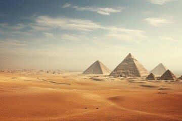 Panoramic view of the pyramids from a distant hill.