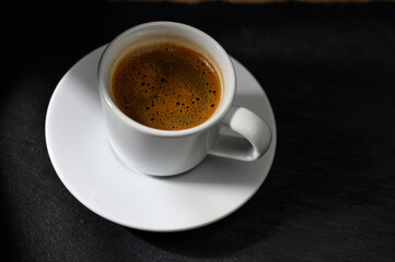 cup of Turkish coffee on a black background