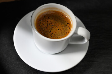 Traditional Turkish coffee on black background