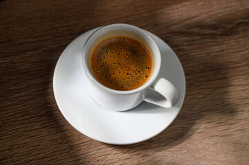 Aesthetic presentation of Turkish coffee on wooden table