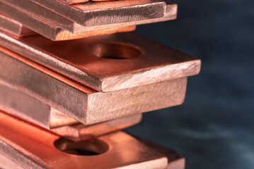 Copper flat bars, clean and polished, close-up view