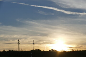 Sunset with electricity pole
