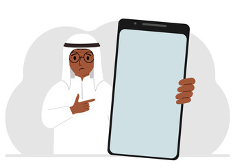 A man holds a mock-up of a large smartphone with a blank screen and with his second hand points to the screen of the phone. Vector flat illustration