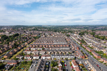 Aerial drone photo of the British town of Harrogate in North Yorkshire England which is east of the Yorkshire Dales in the summer time showing streets of residential housing estates from above
