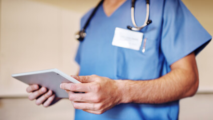 Hospital, wellness and hands of doctor on tablet for medical service, insurance and telehealth consulting. Healthcare, clinic and closeup of man on digital tech for internet, website and research