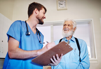 Doctor, men and senior patient with clipboard, writing and questions for report with smile for healthcare. People, medic and discussion for wellness with paperwork, checklist or survey at hospital