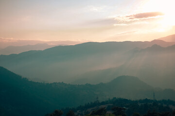 Smoky Sunset View from the Top of a Mountain