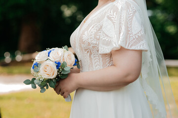 Elegant bridal bouquet with white and blush roses