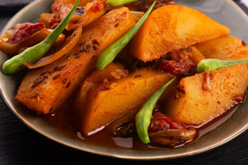 fried potatoes with paprika sauce. crispy fried patata bravas, fried potatoes with smoked paprika sauce