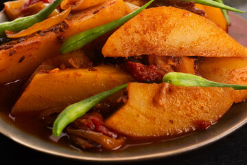fried potatoes with paprika sauce. crispy fried patata bravas, fried potatoes with smoked paprika sauce