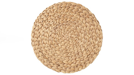 Top view closeup of woven straw coaster on white background.