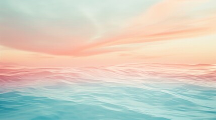 Obraz premium A serene and calming scene of ocean waves with soft pastel hues in the sky, blending seamlessly into the horizon, captured during a beautiful sunset.